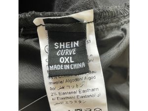 Черни накъсани дамски дънки SHEIN XL