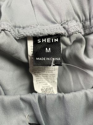 Дамско спортно долнище с джобчета и връзки SHEIN M