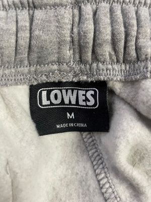 Дамско спортно долнище с джобчета и връзки LOWES M