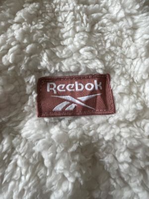 Дамско елече с две лица, джобове и цип REEBOK L