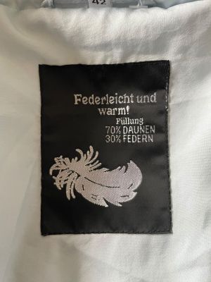 Светло синьо дамско зимно яке с джобове, копчета и цип L